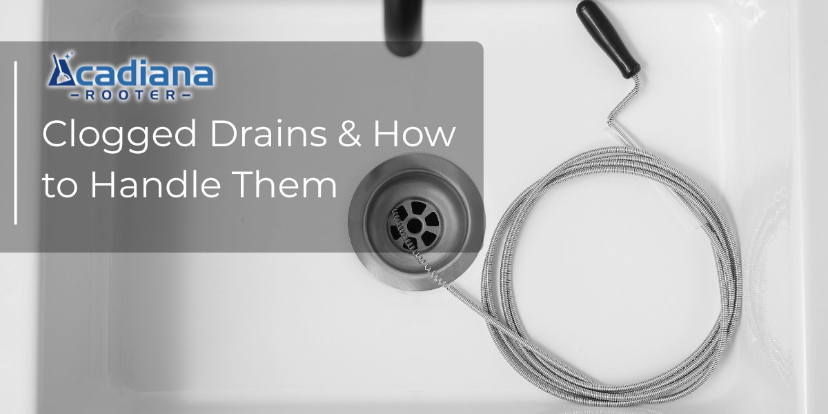 A rooter tool in a clogged sink drain